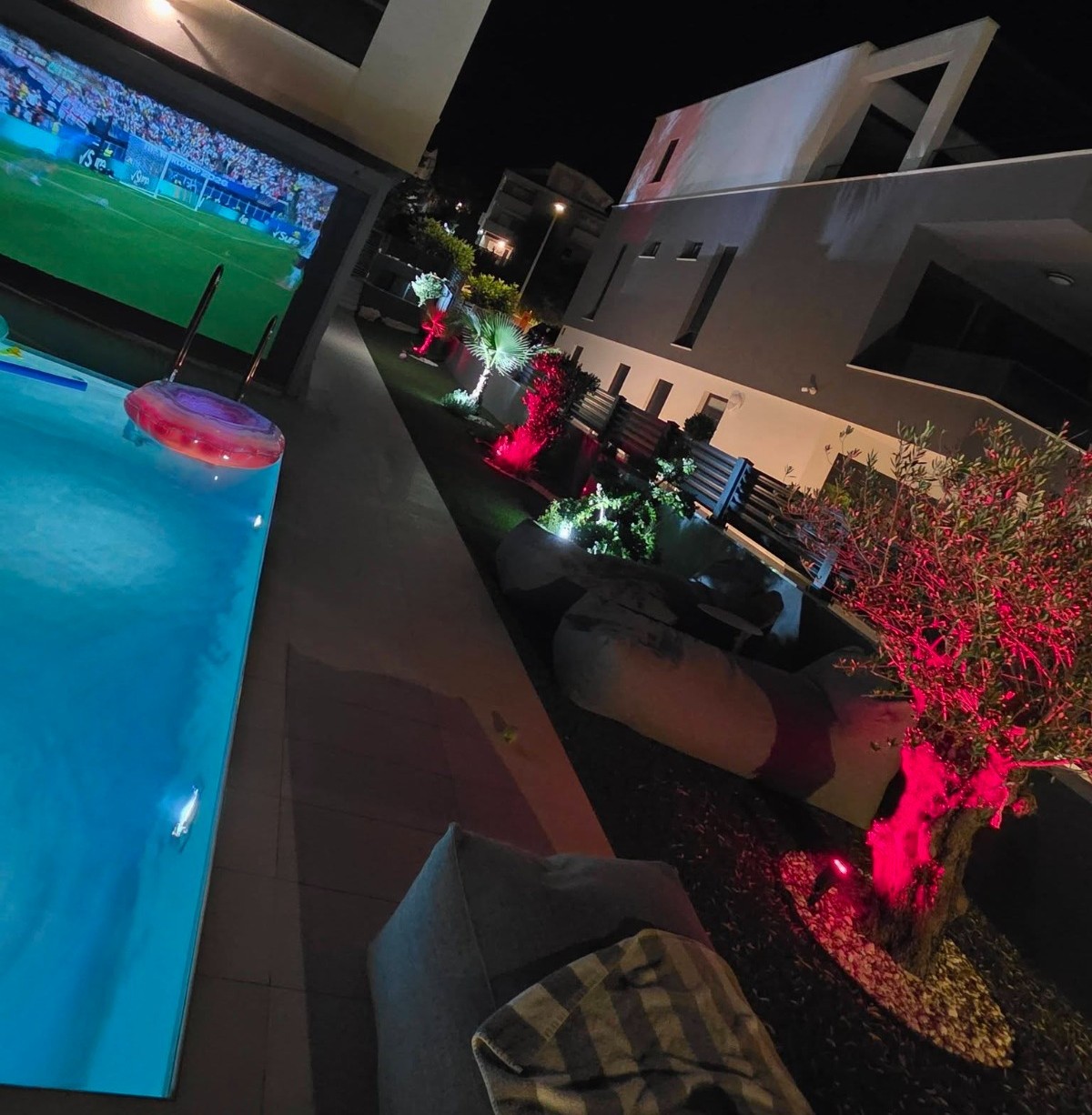 Private outdoor cinema beside the pool at Olea Pool Residence in Novalja, Pag
